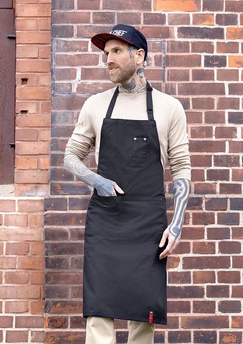 Latzschürze ROCK CHEF®-Stage2 mit Schnalle und Taschen Latzschürze ROCK CHEF®-Stage2 mit Schnalle und Taschen